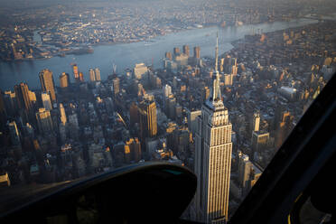An aerial helicopter view of the Empire State Building in New York. - CAVF78434