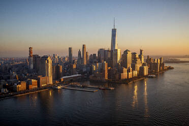 Sunset on Freedom Tower and the Financial District in New York City. - CAVF78435