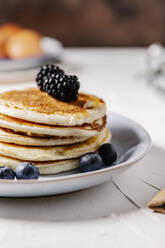Close up of a stack of fresh homemade pancakes - CAVF78553
