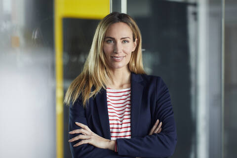 Portrait of confident businesswoman in office stock photo