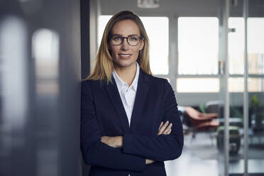 Portrait of confident businesswoman in office - RBF07516