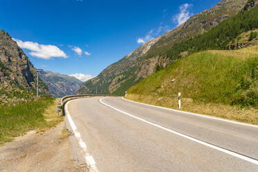 Alpine road near Zermatt in Valais Kantone in summer with greenery - CAVF78718