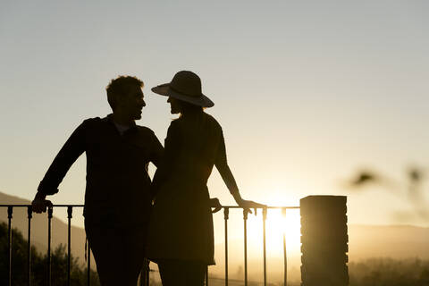 Couple enjoying the sunset in the mountains, Orgiva, Andalusia, Spain stock photo