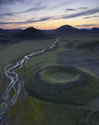 River and crater in evening in highlands - CAVF79039