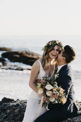 Happy bridal couple at the beach - LHPF01255