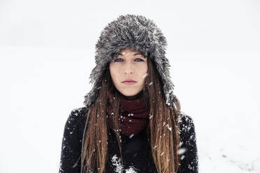 Portrait of serious young woman in winter - WFF00297