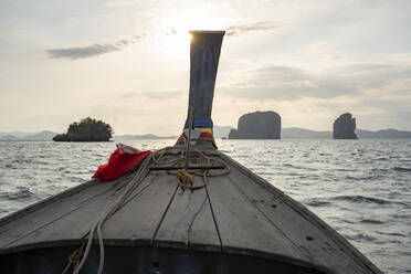 Boat trip on the sea at sunset, Ko Yao Yai, Thailand - FBAF01454