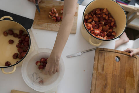 Preparing strawberries stock photo