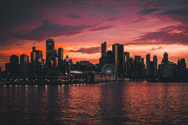 Buildings By Lake Against Sky At Dusk - EYF04090