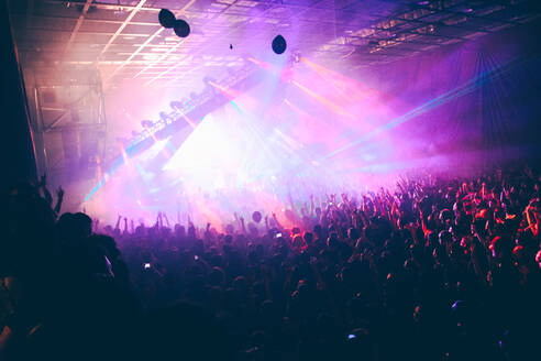 Crowd Enjoying At Illuminated Musical Concert At Night - EYF04113