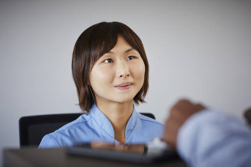 Portrait of receptionist in a dental practice - PWF00002