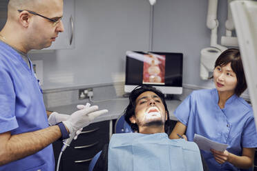 Man receiving dental treatment - PWF00012