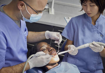 Woman receiving dental treatment - PWF00024