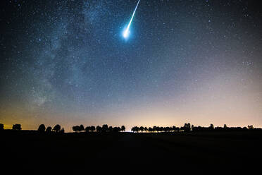 Low Angle View Of Meteor Shower And Star Field In Sky - EYF04211