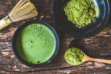 Directly Above Shot Of Matcha Tea In Bowl On Table - EYF04310