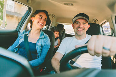 Smiling Family Traveling In Car - EYF04432