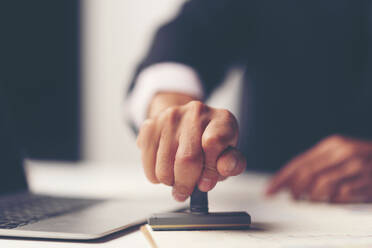 Midsection of Lawyer Working At Desk In Office - EYF04451