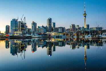 Reflection Of Buildings In Lake Against Sky - EYF04454