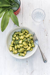 Bowl of homemade gnocchi with leek pesto - IPF00536