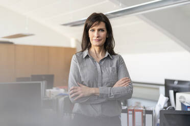 Portrait of confident businesswoman in office - DIGF09685