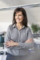 Portrait of confident businesswoman in office - DIGF09686