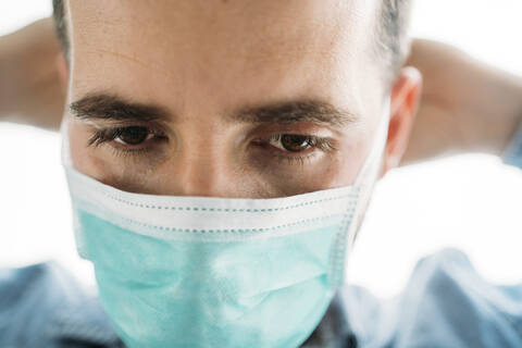 Close-up of businessman wearing protective mask during coronavirus outbreak, Almeria, Spain, Europe stock photo