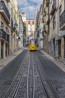 Portugal, Lisbon, Cable car driving along Ascensor da Bica railway line - RPSF00283