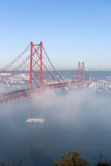Portugal, Lisbon, 25 de Abril Bridge during foggy weather - RPSF00290