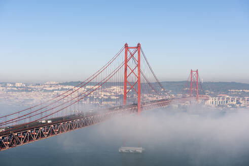 Portugal, Lisbon, 25 de Abril Bridge during foggy weather - RPSF00291