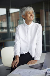 Portrait of relaxed senior businesswoman in her office - RBF07625