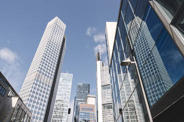 Deutschland, Hessen, Frankfurt, Low angle view of downtown skyscrapers - AHSF02304