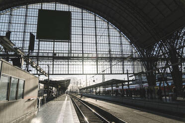 Germany, Hesse, Frankfurt, Train station interior at sunset - AHSF02320