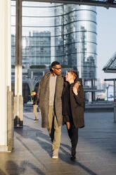 Young couple walking in the city - MEUF00427