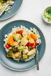 Paleo sweet and sour chicken over cauliflower rice flatlay - CAVF79660