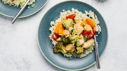 Paleo sweet and sour chicken over cauliflower rice flatlay - CAVF79662