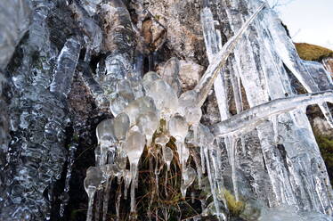 Autumn streams frozen drop by drop in Northern Norway - CAVF79723