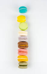 Delicious macarons tower on white background - CAVF79977
