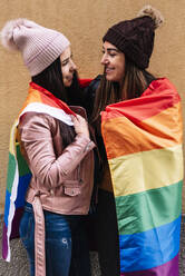 Lovely lesbian couple celebrating Pride Day. LGBT Concept. - CAVF80143