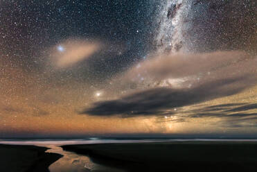 Starry night sky over New Zealand beach - CAVF80206