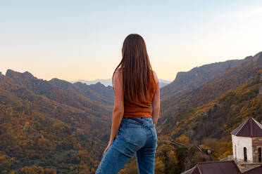 Girl in the background of the autumn gorge - CAVF80366