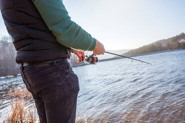 Fishing on the lake at sunset. Fishing background. - CAVF80436