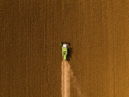 Aerial view of combine harvester on a field of soybean - NOF00081