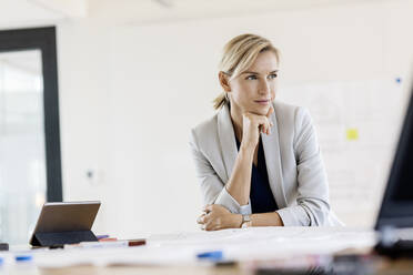 Blond businesswoman in conference room - PESF01967