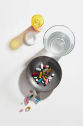 Bottle of Pills with Glass of Water and Dish - CAVF80799