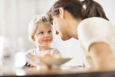 Mother and daughter during dinner at home - SDAHF00765