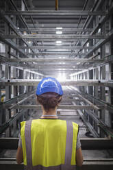 Female worker in steel factory - CAIF26773