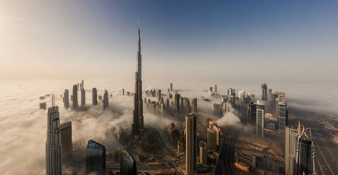 Aerial view of buildings surrounded by clouds Dubai, United Arab Emirates - AAEF07980