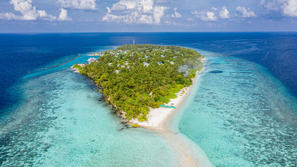Aerial view of local island Omadhoo, located in Alif Dhaal Atoll, Maldives, Indian Ocean with reef, harbour, local beach, bikini / guest beach and sandbank - AAEF08293
