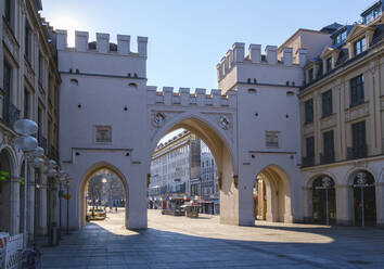 Germany, Bavaria, Munich, Medieval Karlstor gate and empty Neuhauser Strasse - SIEF09797