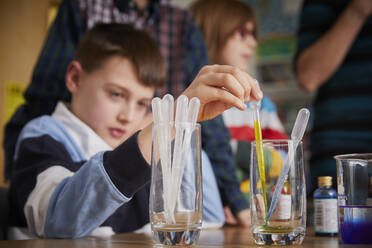 Child in a science chemistry lesson - PWF00060